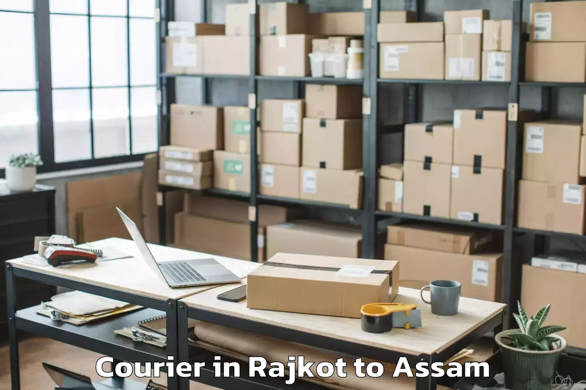 Reliable Rajkot to Chariduar Courier